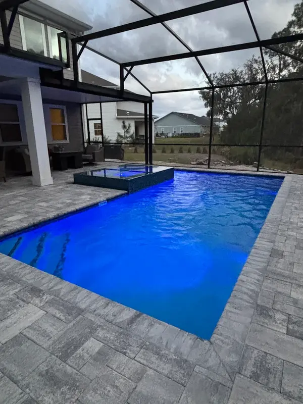 Finished swimming pool filled with water